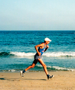 Joss runs along the beach at Mil Palmeras.