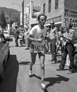 Joss runs through the streets of Manitou Springs on his descent from Pikes Peak.